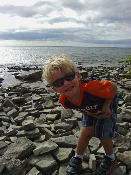 playing on the slag beach at fayette state park